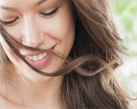 Picture of a shy girl feeling happy and smiling